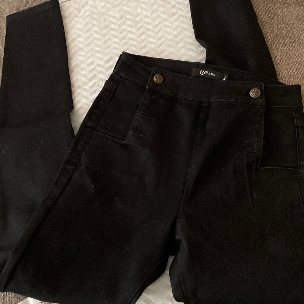 Black pants with anchor buttons